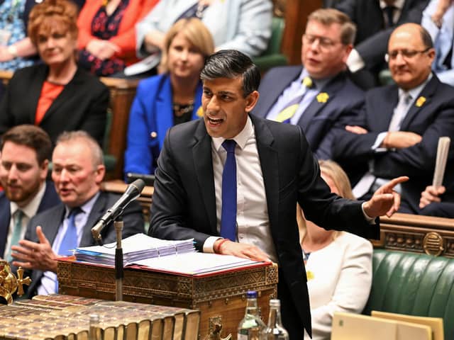 A handout photograph released by the UK Parliament shows Britain's Prime Minister Rishi Sunak speaking during the weekly session of Prime Minister's Questions (PMQs) in the House of Commons, in central London, on March 20, 2024. (Photo by JESSICA TAYLOR / UK PARLIAMENT / AFP) / RESTRICTED TO EDITORIAL USE - NO USE FOR ENTERTAINMENT, SATIRICAL, ADVERTISING PURPOSES - MANDATORY CREDIT " AFP PHOTO / UK Parliament" (Photo by JESSICA TAYLOR/UK PARLIAMENT/AFP via Getty Images)