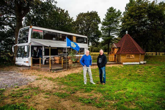 David and Andrew Kelly with the newly converted bus, which is now a holiday let
