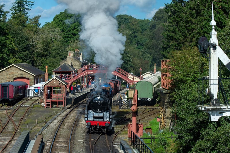 Visiting locomotive Great Central Railway and David Clarke Railway Trust's BR Standard Class 9F 2-10-0 No. 92214 pulling freight leaving Goathland.
Picture by Yorkshire Post Photographer Bruce Rollinson
21 September 2023.