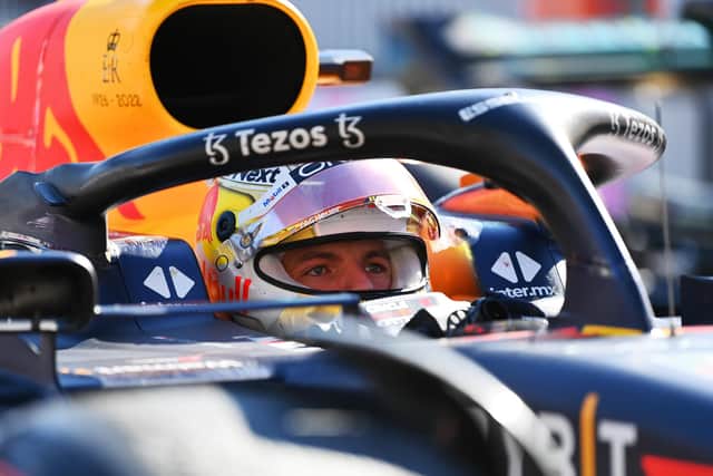 MONZA, ITALY - SEPTEMBER 11: Race winner Max Verstappen of the Netherlands and Oracle Red Bull Racing stops in parc ferme during the F1 Grand Prix of Italy at Autodromo Nazionale Monza on September 11, 2022 in Monza, Italy. (Photo by Dan Mullan/Getty Images)
