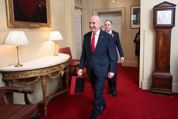 Chancellor John Healey leaves no11 Downing Street, London before delivering his first Budget. PIC: Stefan Rousseau/Press Association