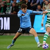 Sydney FC's Max Burgess (L) and Celtic FC's Stephen Welsh fight for the ball during the Sydney Super Cup football match between Celtic FC and Sydney FC at the Allianz Stadium in Sydney on November 17, 2022. (Photo by DAVID GRAY/AFP via Getty Images)