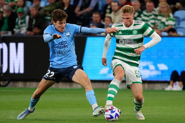 Sydney FC's Max Burgess (L) and Celtic FC's Stephen Welsh fight for the ball during the Sydney Super Cup football match between Celtic FC and Sydney FC at the Allianz Stadium in Sydney on November 17, 2022. (Photo by DAVID GRAY/AFP via Getty Images)