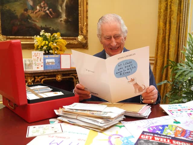 King Charles III reads cards and messages, sent by well-wishers following his cancer diagnosis, Jonathan Brady/PA Wire