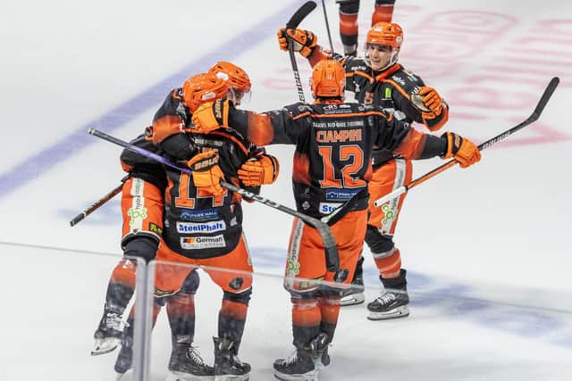 THAT'LL DO NICELY: Sheffield Steelers' players celebrate Patrick Watling's goal. Picture: Tony Johnson.