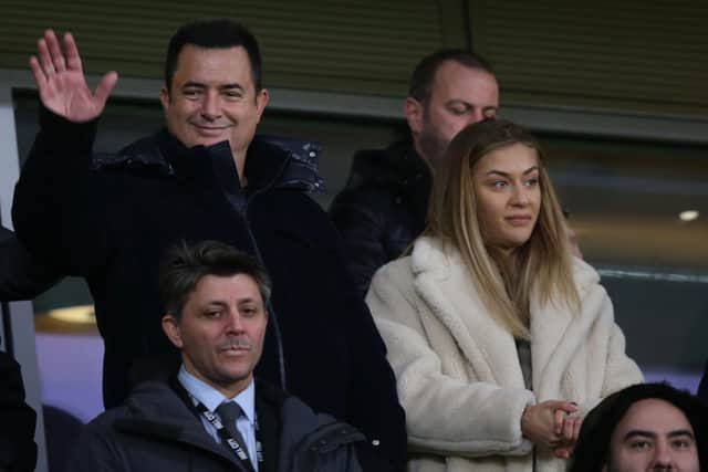 BELIEFS: Hull City owner/chairman Acun Ilicali (waving) and vice-chairman Tan Kesler (front, left)