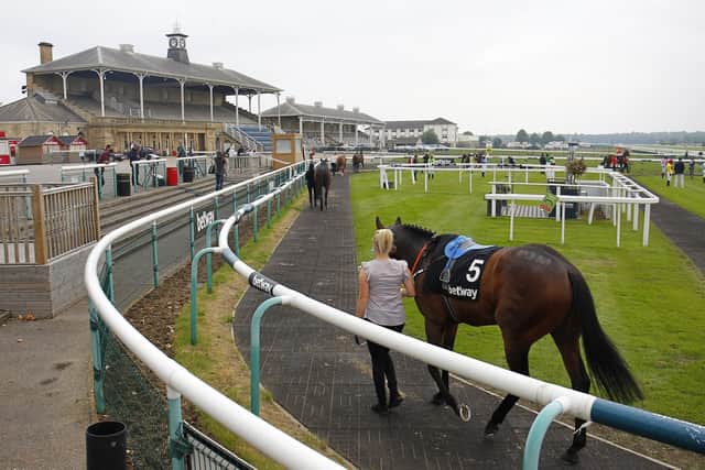 Will racing go ahead at Doncaster on Saturday? (Picture: PA)