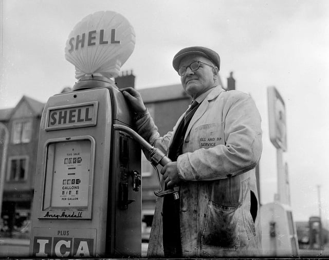 Pensioner and part-time petrol pump attendant Henry Richmond at his Shell filling station on Liberton Brae in 1961.