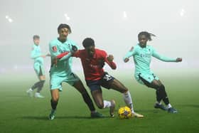 York City and Wigan Athletic battled it out in thick fog. Image: Stu Forster/Getty Images