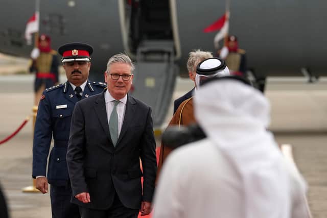 Prime Minister Sir Keir Starmer arrives at an airport in Bahrain, as part of a two-day visit to the Gulf region. PIC: Alastair Grant/PA Wire