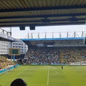 SUPPORT: Leeds United fans were housed in Carrow Road's South Stand on Sunday,. The incident is alleged to have taken place behind the Barclays Stand (left)