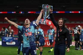 LONDON, ENGLAND - JULY 13: Matt Bloomfield of Wycombe Wanderers and Gareth Ainsworth manager of Wycombe Wanderers celebrate with the trophy after the Sky Bet League One Play Off Final between Oxford United and Wycombe Wanderers at Wembley Stadium on July 13, 2020 in London. (Photo by Catherine Ivill/Getty Images)
