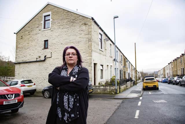 Sharon Lord, 47, a Benefits Assessor from Burnley, stood outsider her home. She is one of around 1,400 people saddled with huge unexpected payments after SSB Law stopped trading in January, with debts of millions.  Hundreds of householders face losing their homes after signing up to a controversial 'no win no fee' legal firm which has collapsed owing £48m.Around 1,500 residents were offered free legal representation by SSB Law, which said it would help them win compensation for dodgy cavity wall insulation.However, the Sheffield-based firm fell into administration in January leaving them liable for huge court fees.The firm also faces a probe by legal and financial watchdogs.