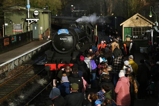 People wait to board the North Yorkshire Moors Railway's Whitby Winter Excursion at Pickering Station