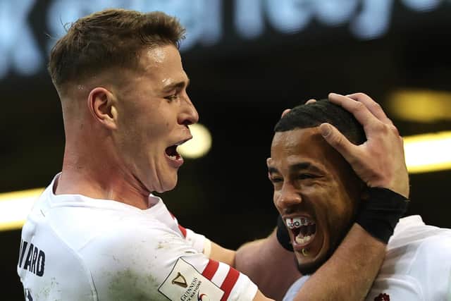 Anthony Watson, right, of England celebrates with team mate Freddie Steward after scoring their first try (Picture: David Rogers/Getty Images)