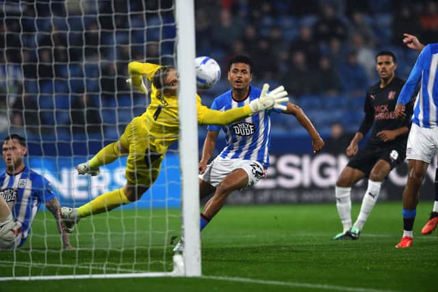 Huddersfield Town's Ilias Bronkhorst scores the opening goal against Peterborough United - his first strike for the club. Picture: Jonathan Gawthorpe