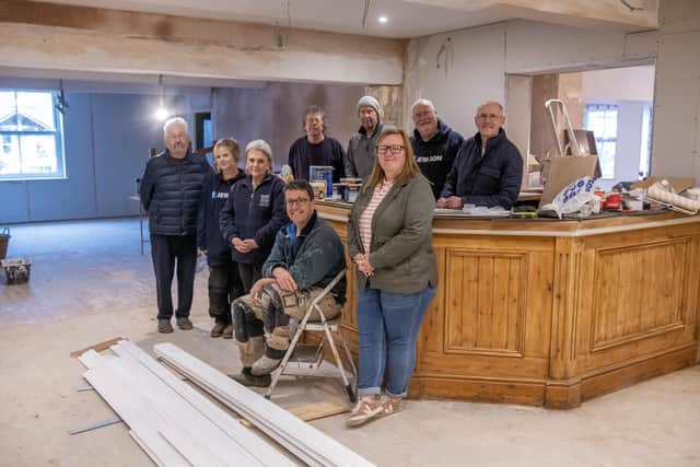 Some of the volunteers and commitee members at The historic Black Lion in Skelton-on-Ure near Boroughbridge currently undergoing a major refurbishment after the community acquired the pub. Photograph by Tony Johnson.