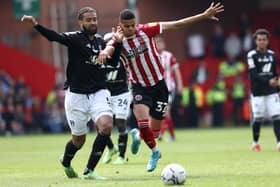 Sheffield, England, 7th May 2022.   Michael Hector of Fulham challenges Will Osula of Sheffield Utd during the Sky Bet Championship match at Bramall Lane, Sheffield. Picture credit should read: Darren Staples / Sportimage