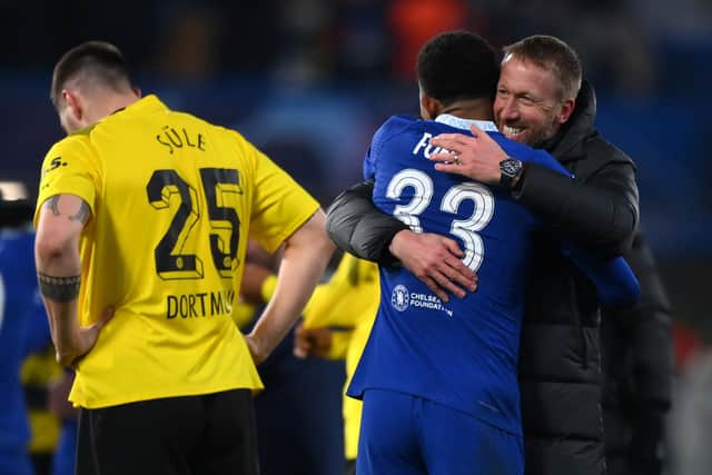 Wesley Fofana embraces Graham Potter, Manager of Chelsea, after the UEFA Champions League round of 16 leg victory over Borussia Dortmund (Picture: Justin Setterfield/Getty Images)