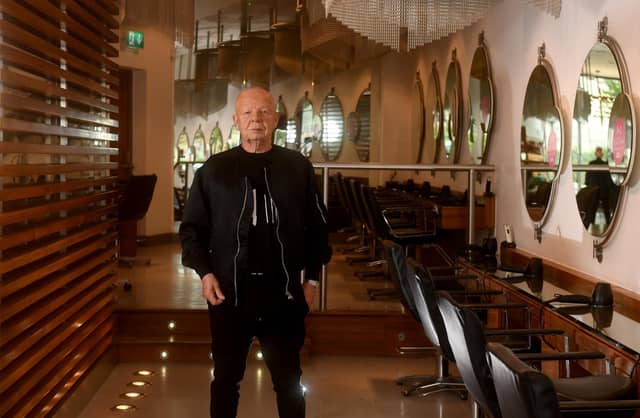 Russell Eaton inside his salon on Shambles Street, Barnsley. Russell had has a salon in the town since 1978, and still has clients from that time. Picture: Yorkshire Post Photographer Simon Hulme.