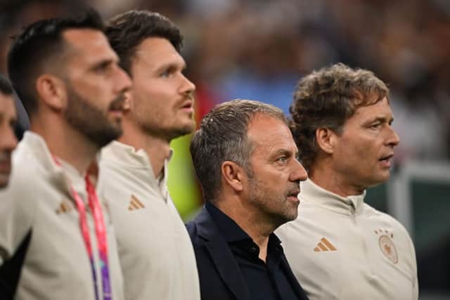 NATIONAL DUTY: Danny Rohl (second from right) alongside Germany head coach Hansi Flick (third from right) as they sing the national anthem before the group game with Costa Rica