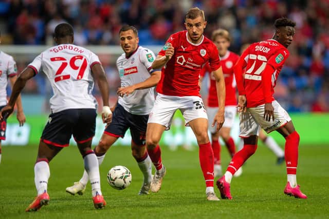 RED ALERT: Huddersfield Town's Michal Helik (centre) broke into the Poland set-up on the back of his performances for Barnsley