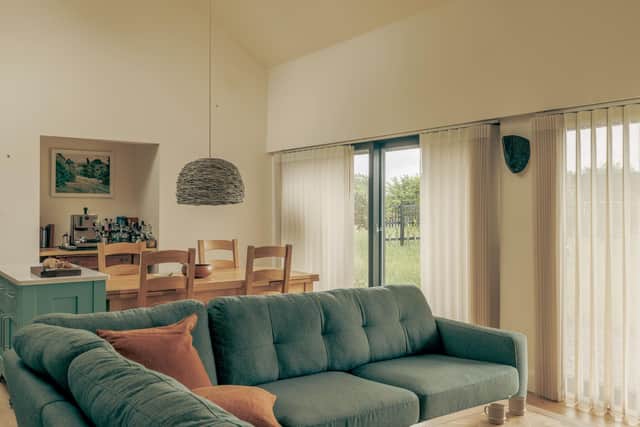 The open plan kitchen, dining and living space in the home of Abbie and Chris Jaume, by HebHomes. Picture: Richard Gaston