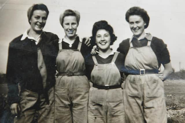 Muriel Berzins ( 3rd left) from Aldborough near Hull   a Land Girl  during World War 2  pictured with other Land Girls .