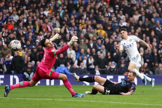 UNSTOPPABLE: Neither Tom Lees nor Lee Nicholls can prevent Dan James scoring Leeds United's third goal