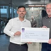 Navigation Wealth’s CEO Matt Hammond presents a cheque for £25,000 to Paul Matson BEM, founder of Hull 4 Heroes.