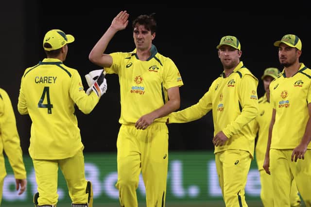 WINNERS: Australia's Pat Cummins, center, celebrates with team-mates after taking the wicket of England's Jason Roy, left, during the third and final ODI in Melbourne Picture: AP/Asanka Brendon Ratnayake