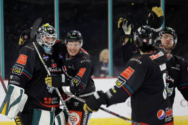 BIG WIN: Belfast Giants’ Tyler Beskorowany, Josh Roach and Grant Cooper (far right) celebrate after defeating Sheffield Steelers in the penalty shootout last Saturday  Picture courtesy of William Cherry/Presseye/EIHL