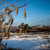 A destroyed Russian tank sits in a snow covered wheat field in Kharkiv region on February 22, 2023. PIC: ANATOLII STEPANOV/AFP via Getty Images