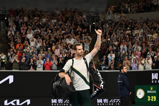 Britain's Andy Murray waves as he leaves after losing to Spain's Roberto Bautista Agut during their men's singles match on day six of the Australian Open tennis tournament in Melbourne on January 21, 2023. (Photo by WILLIAM WEST/AFP via Getty Images)