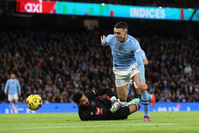 CHANCE: Phil Foden ois denied by Wes Foderingham