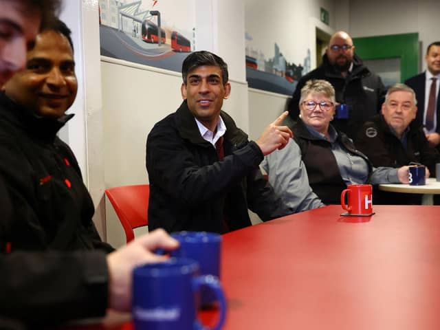 Prime Minister Rishi Sunak meets with bus drivers during his visit to a bus depot in Harrogate, North Yorkshire.