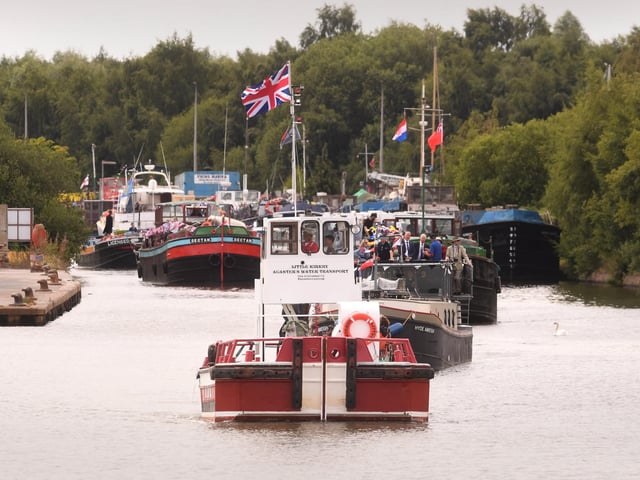 The flotilla heads through the canal, with boats of all shapes and sizes taking part in the celebration of Goole's maritime heritage