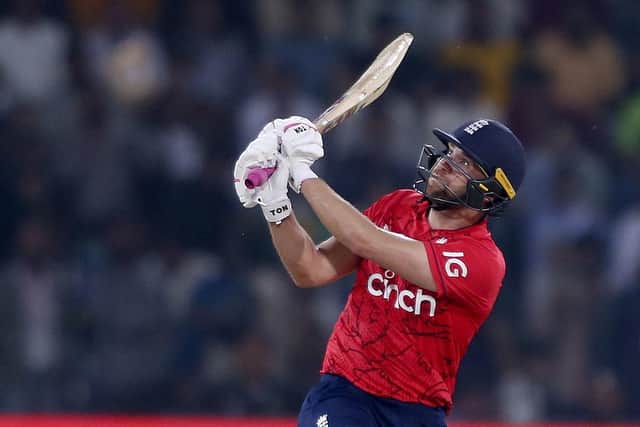 England's Dawid Malan follows the ball after playing a shot for six during the seventh twenty20 cricket match between Pakistan and England. (AP Photo/K.M. Chaudary)