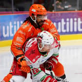WE'LL MEET AGAIN: Sheffield Steelers' Matt Petgrave gets to grips with Cardiff's Justin Crandall during their pre-season encounter.