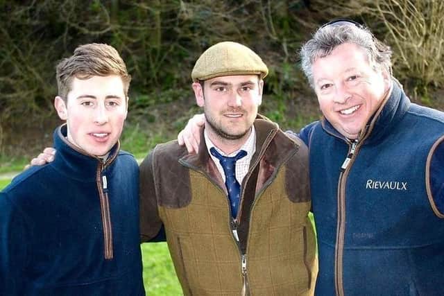 Charlie Birkett, left, with his father Justin, right, and the head keeper of the Rievaulx Estate. Photo courtesy of the estate