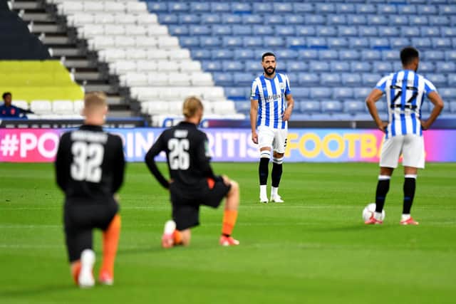 DIVISIVE: A number of Football League clubs, such as Huddersfield Town, stopped taking the knee