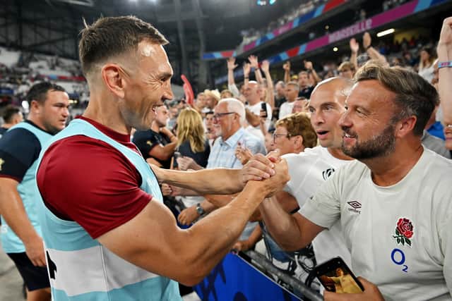 England defence coach Kevin Sinfield celebrates with fans at full-time after beating Argentina at the Stade Velodrome in Marseilles on Saturday. Picture: Dan Mullan/Getty Images
