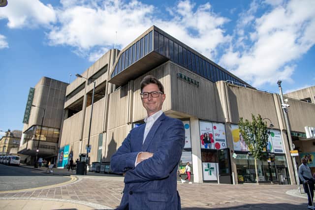 James Pitt, managing director for Yorkshire and the North East at Muse, outside the Kirkgate Shopping Centre in Bradford, photographed for The Yorkshire Post by Tony Johnson.  The developer is preparing plans to demolish the shopping centre and create a city village of 1,000 homes on the site.