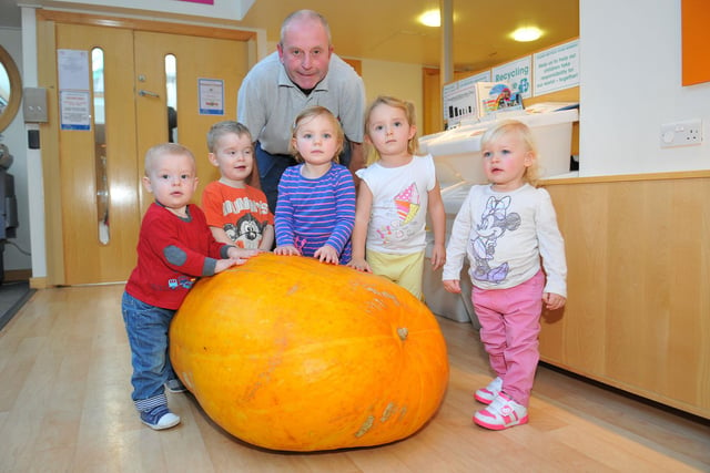 Keith Davison was at the Wingate Sure Start Centre with (left to right) Quade Charlton, James Box, Eliza Dixon, Libby Harris and Freya Gourley and he brought along his 2-metre pumpkin.