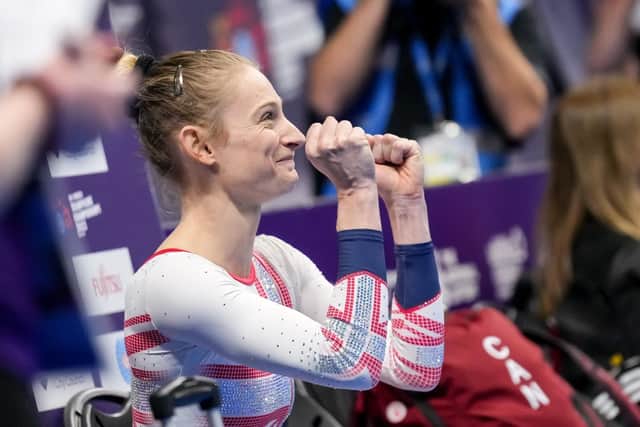 Delight: Bryony Page reacts after regaining the world trampolining title in Birmingham.
