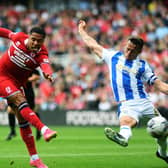 Middlesbrough v Huddersfield Town. Boro's Sammy Silvera gets a shot on goal, despite the attention of Terriers captain Jonathan Hogg. Picture: Jonathan Gawthorpe.