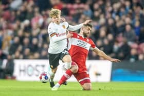 Hull City teenage prodigy Harry Vaughan challenges Middlesbrough rival Tommy Smith during the club's meeting at the Riverside Stadium in April. Picture: Tony Johnson