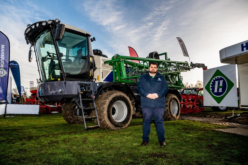 Alex Fisher, Senior Technical Engineer for Househam Sprayers based at Lincolnshire, with their Harrier 4000 crop-sprayer