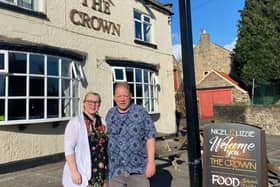Lizzie and Nigel Druery outside of The Crown.