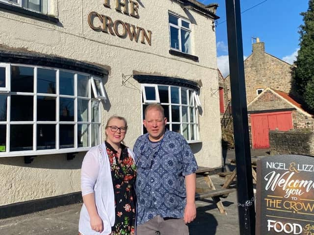 Lizzie and Nigel Druery outside of The Crown.